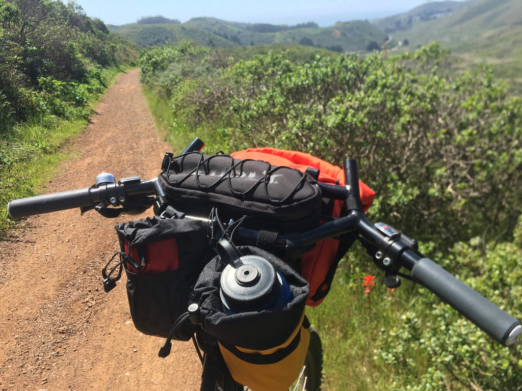 The Road Runner Bags Jammer Bag on Surly Moloko Bars in Orange Cordura Made in the USA